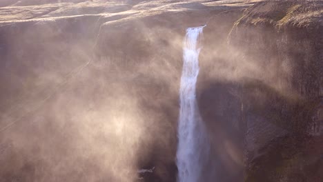 gorgeous and spectacular haifoss waterfall in iceland in spray and mist