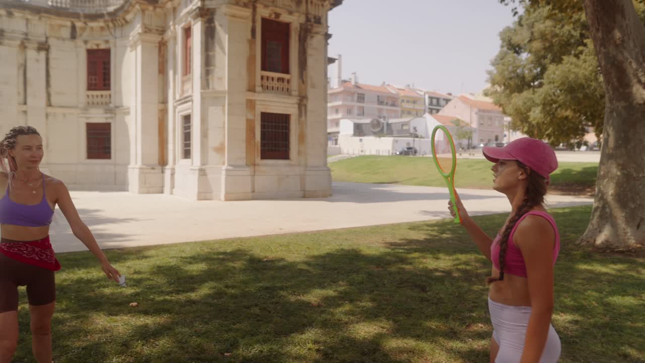 People playing in the park with rackets