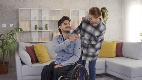 feeling bad, the disabled teenager is helped by his girlfriend and cheers him up.