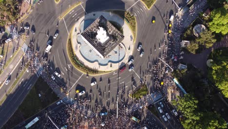 incredible crowd of argentina football fans after final victory of soccer world cup 2022 around magna carta monument, buenos aires