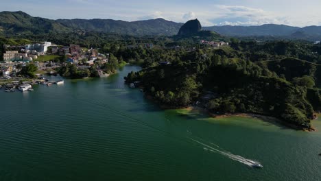 Gorgeous-aerial-shot-of-La-Piedra-landmark-in-Guatape-Colombia