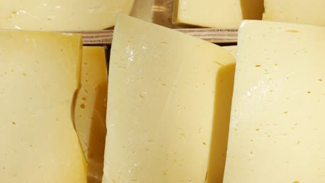 close up of yellow cheese slices