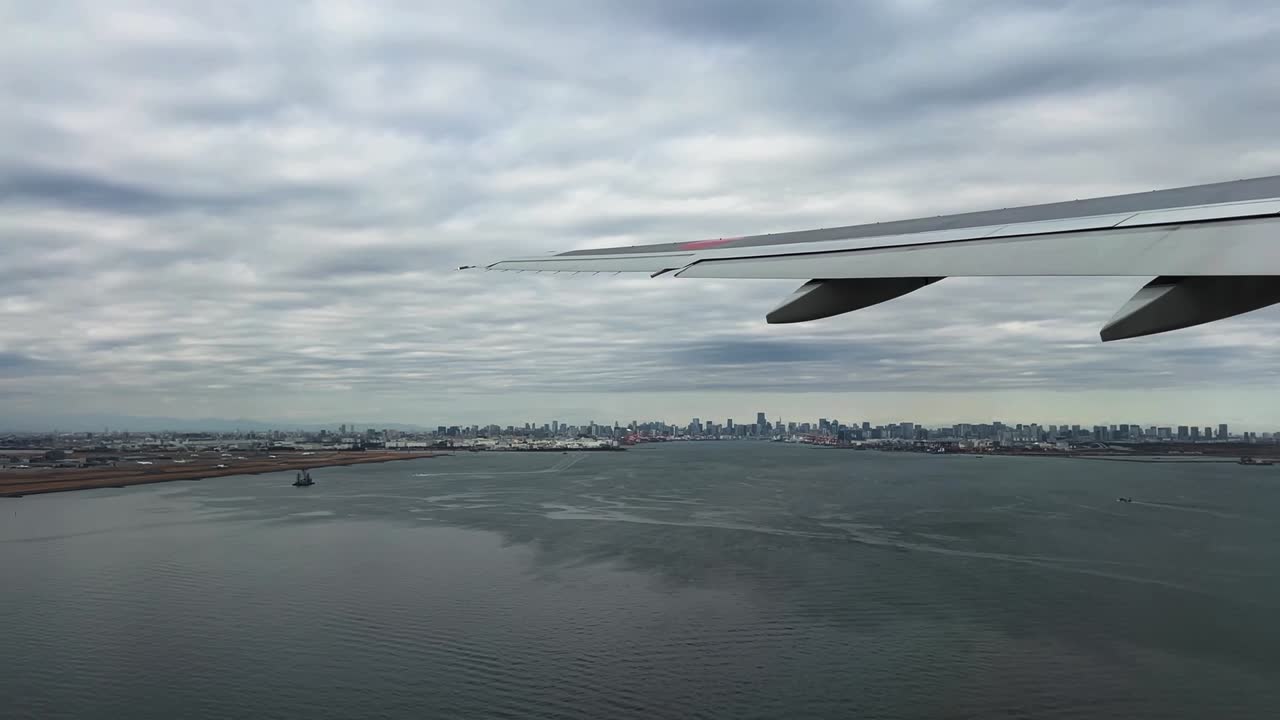 Airplane Taking Off Above Water Window Seat View