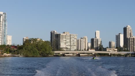 timelapse of river with city skyline backdrop