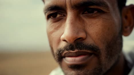 close-up portrait of a man with serious expression