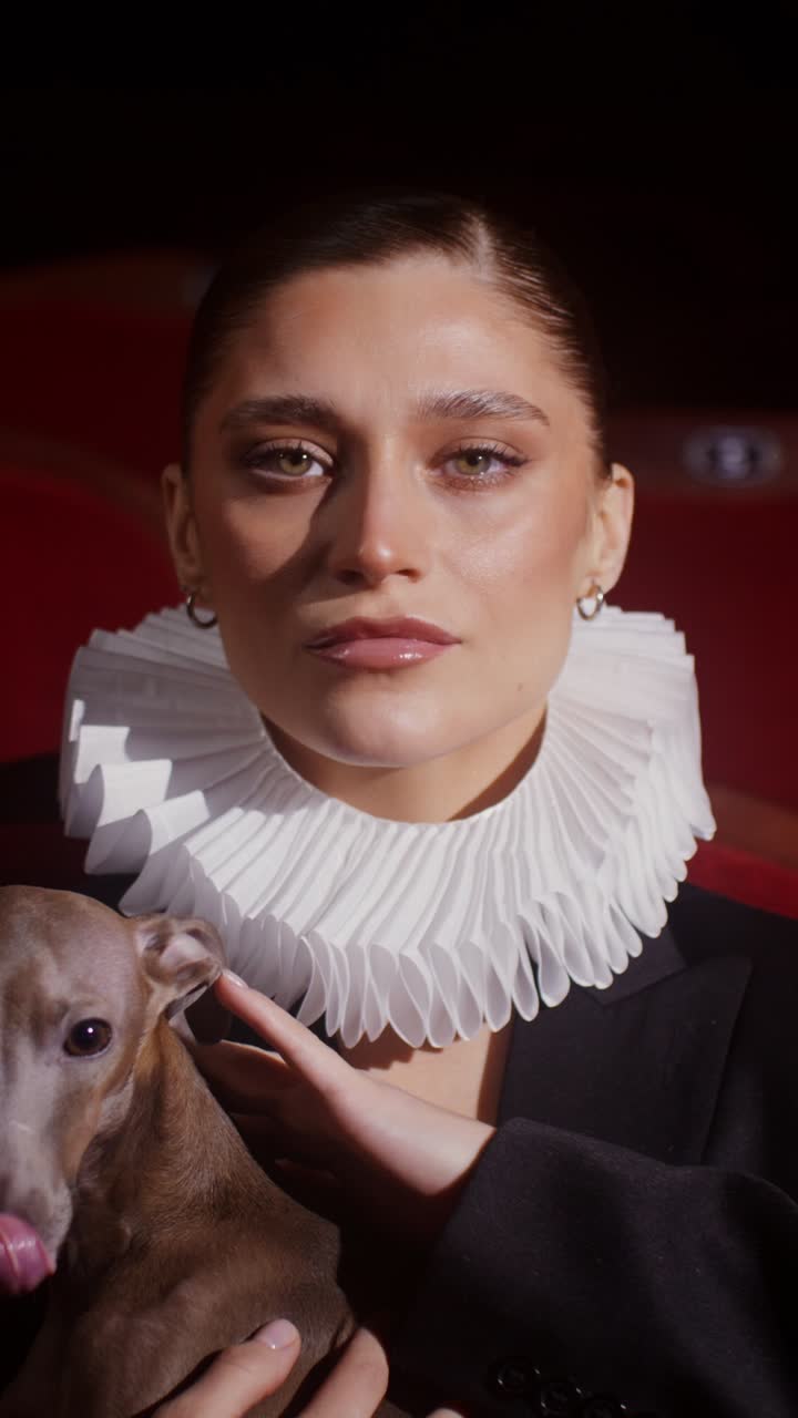 Woman with dog in historical fashion portrait