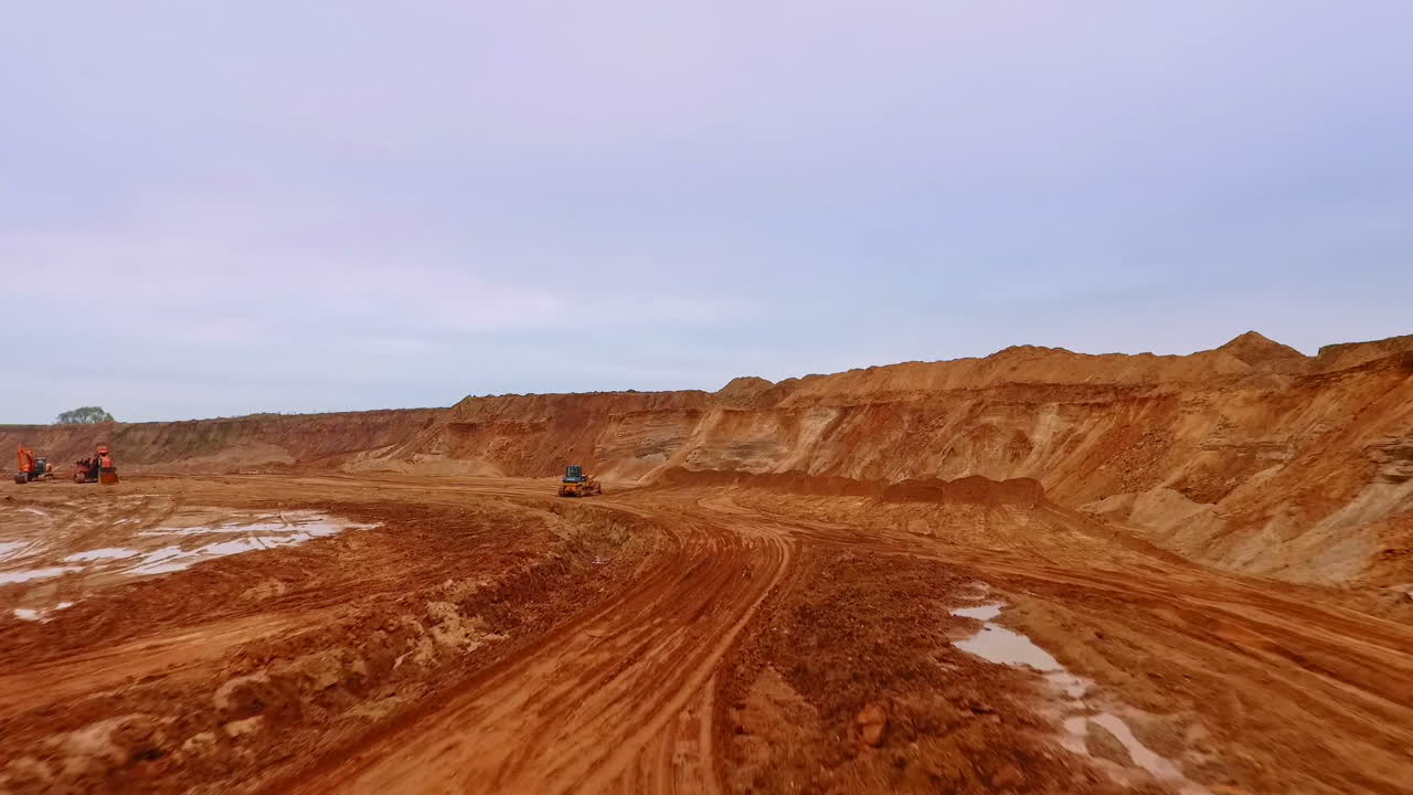 Aerial view of road to industrial territory sand mine. Sand mining process