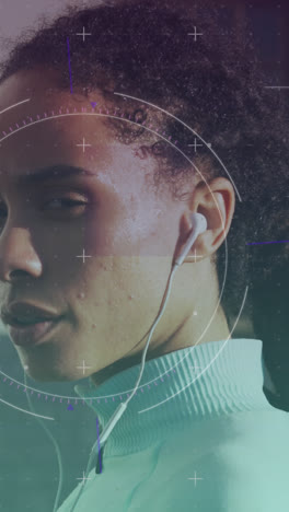 Scope-scanning-against-portrait-of-african-american-fit-woman-wearing-earphones