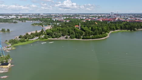 drone approaching the hietaniemi cemetery, sunny, summer day in helsinki