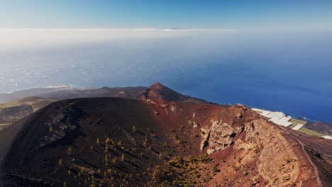 volcanic crater aerial view over ocean