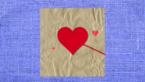 Corazones-Rojos-Con-Flecha-En-Papel-Con-Textil