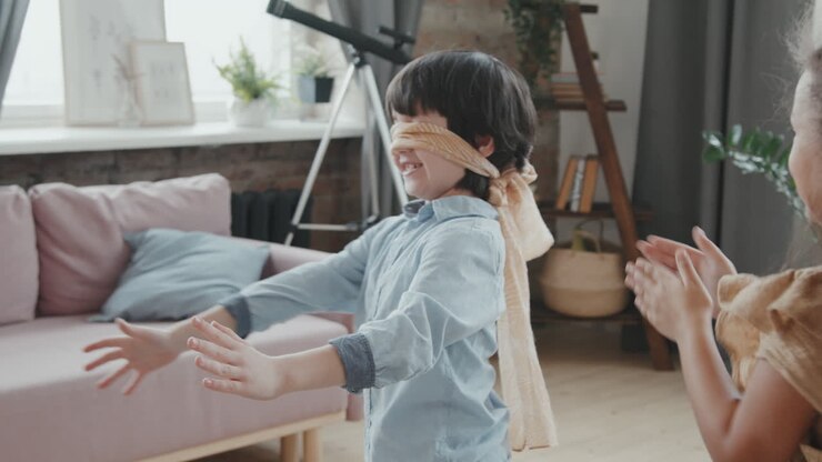 Boy Playing Tag with Friends at Home