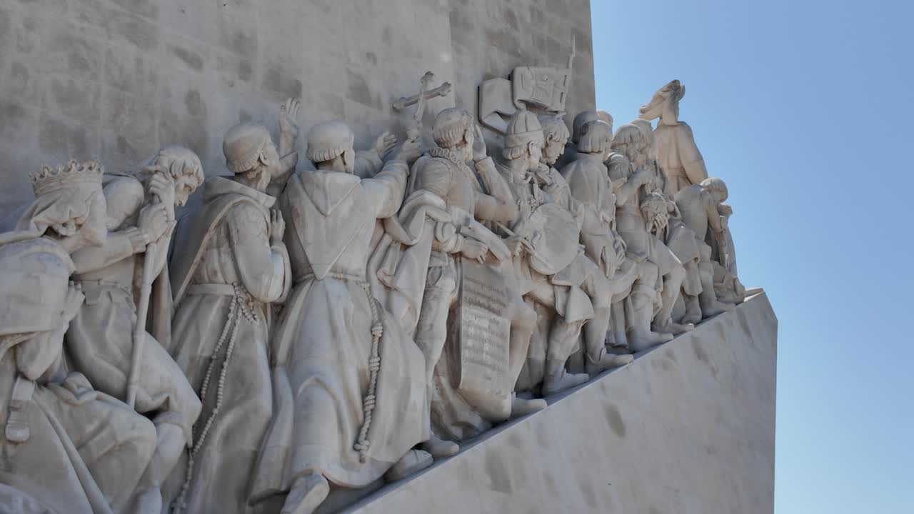 Sculptural depiction of Portuguese explorers on the Monument to the Discoveries in Lisbon