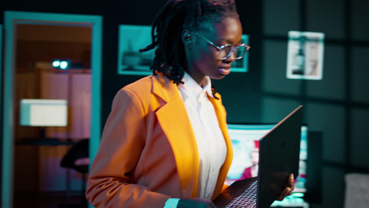 African american student works on school assignments at home