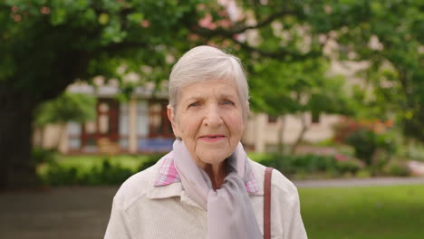 Senior-woman,-smile-and-happy-in-park