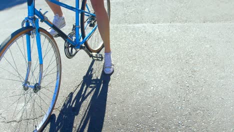 woman riding a bicycle in the street 4k