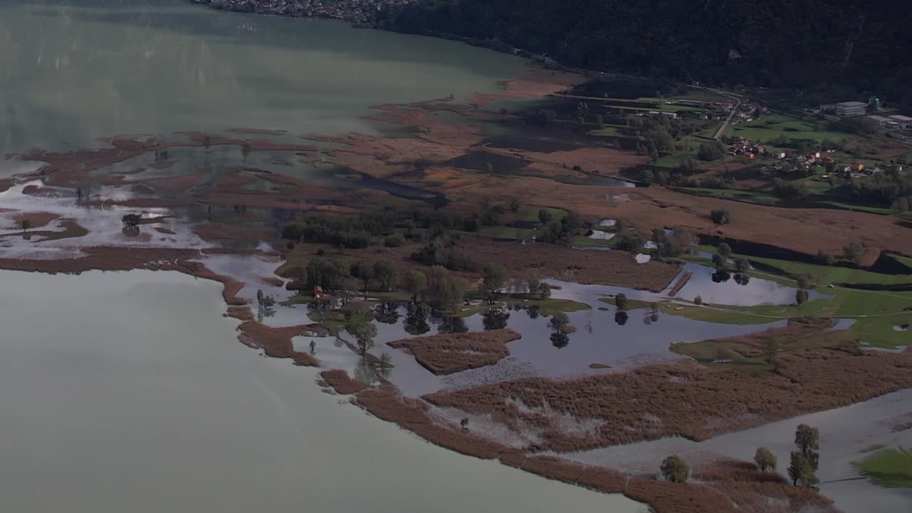 Breathtaking aerial view of the Italian Alps and serene lakescape