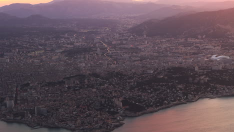 View-From-Above-Of-Marseille-On-The-Coast-Of-Gulf-Of-Lion-In-France-At-Sunset