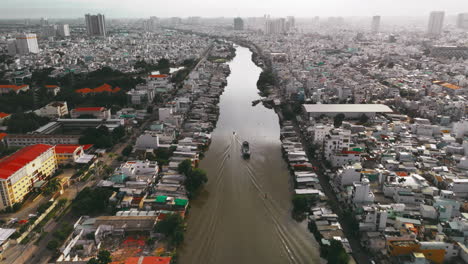 aerial boat passing through the city river