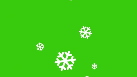 copos de nieve de confeti blancos cayendo en la pantalla verde