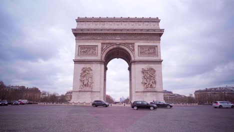 arc de triomphe - arch of triumph in paris, tourism in france on a cloudy day