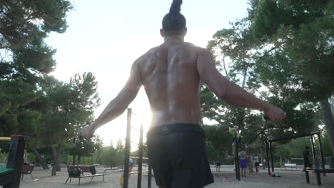 man jumping rope in a park