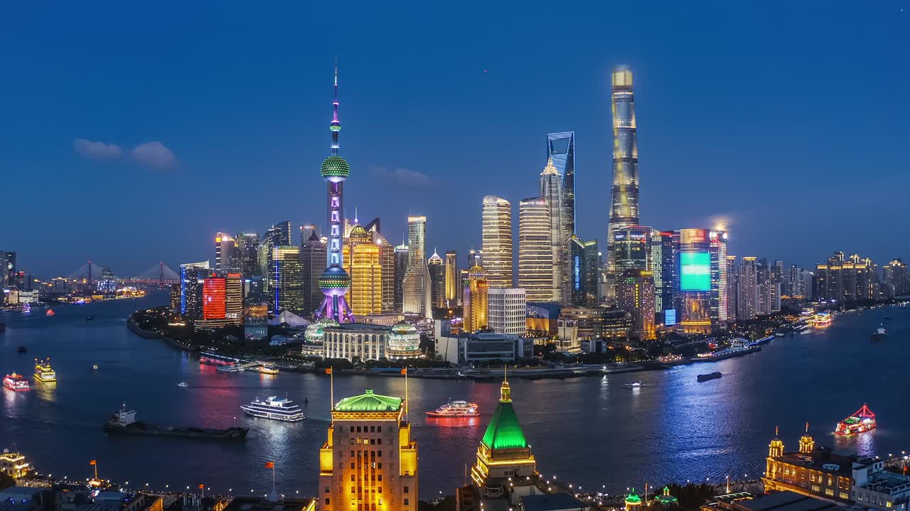 Aerial view of city skyline and commercial buildings in Shanghai