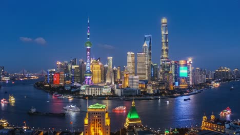 aerial view of city skyline and commercial buildings in shanghai