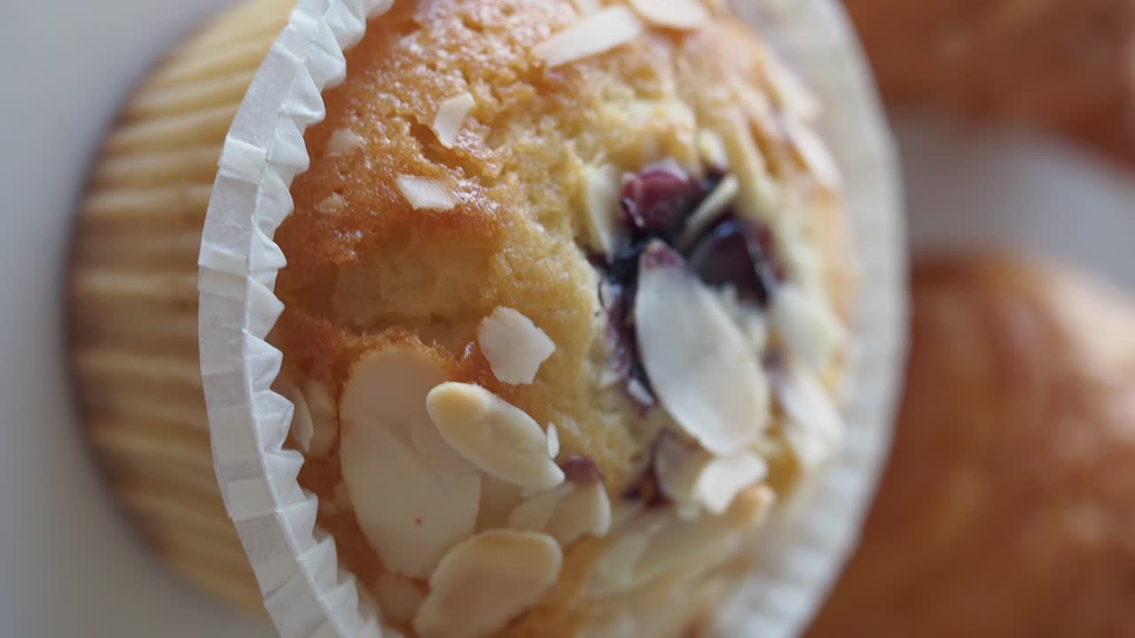 Close-up of a delicious muffin with almonds