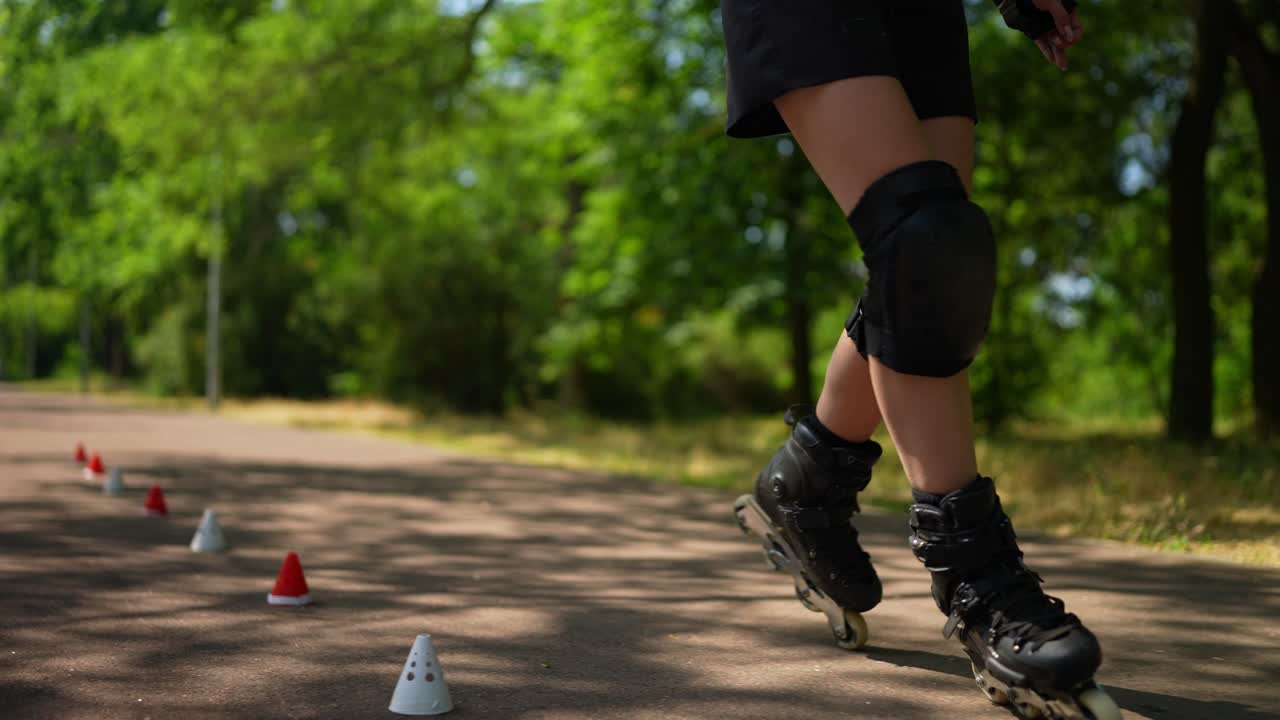 Woman rollerblading in a park