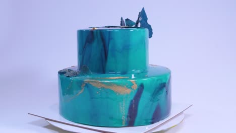 turquoise glazed two-tier cake