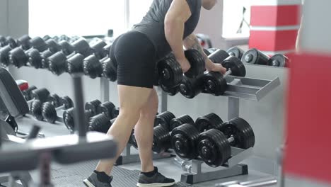 young man preforming dumbbell lateral raise – exercise for shoulders