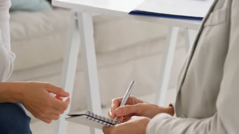 Psychologist-talking-with-her-patient