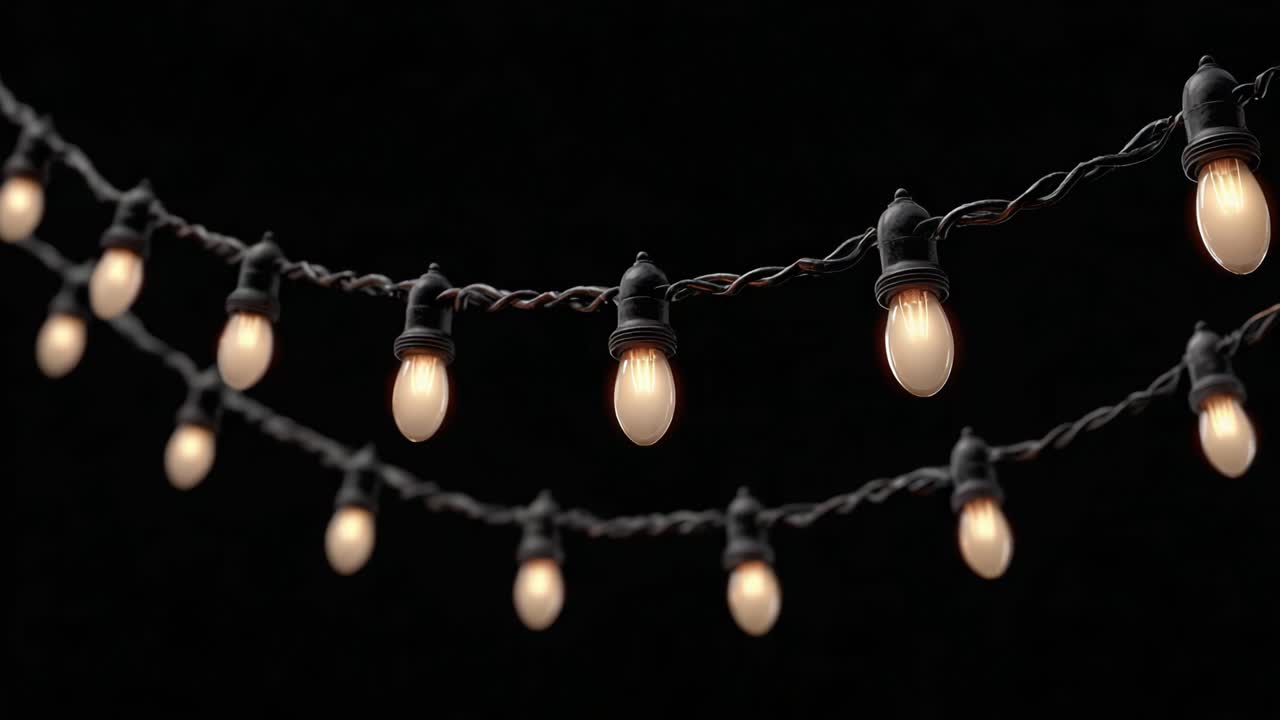A Warm and Inviting Display of Vintage String Lights Illuminating a Dark Background, Perfect for Creating a Charming Ambiance for Any Setting or Occasion