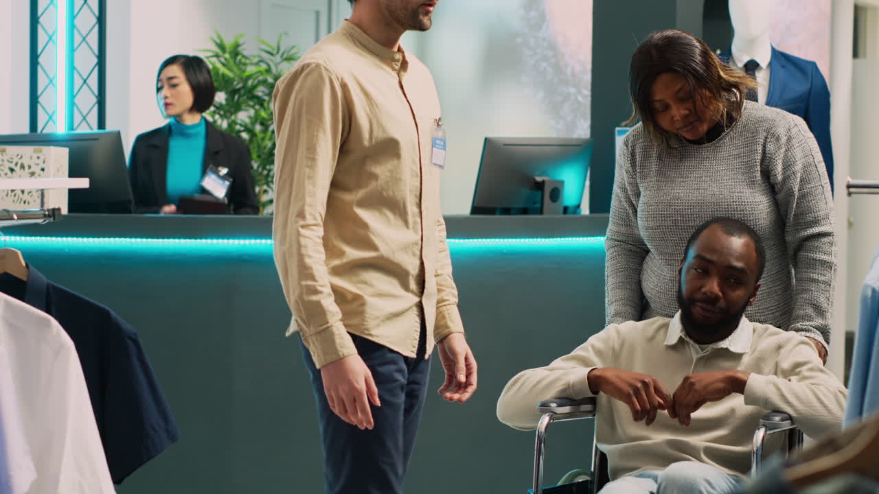 Assisting a Customer in Wheelchair at a Clothing Store