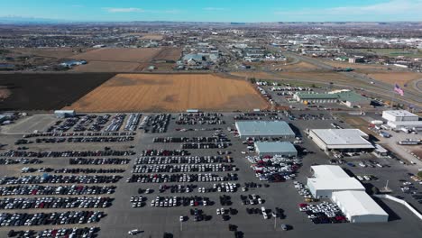 drone aerial view of a large car lot in billings montana