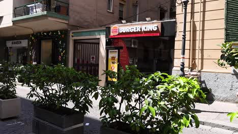 burger king storefront on a sunny street