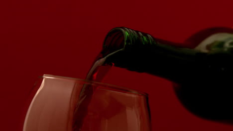 Red-wine-pouring-into-wine-glass