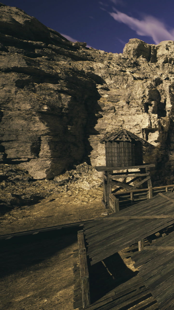 Exploring an abandoned mining site surrounded by rugged cliffs at sunset