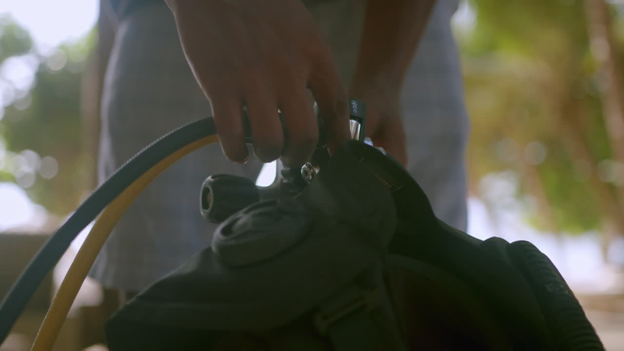 Scuba Diver Preparing His Gear And Air Tank In Tropical Beach Of Kenya