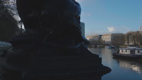 Close-up-on-the-dolphin-lamp-post-at-Albert-Embankment-in-London