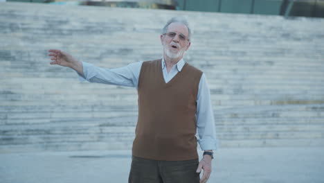 Old-man-looking-at-camera,-doing-body-stretching-exercises