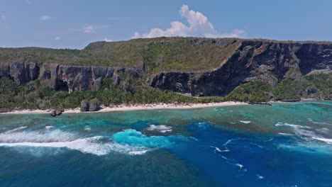 Fronton-beach-with-blue-sea-in-Las-Galeras-Samana,-Dominican-Republic_pan-shot