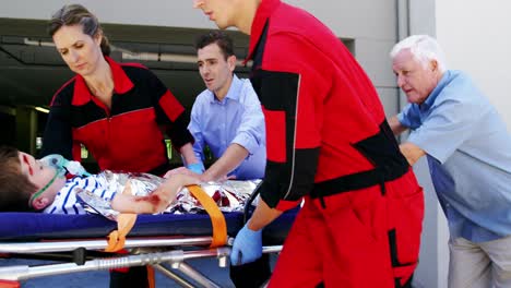 paramedics rushing a patient in emergency