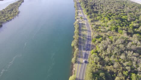 scenic drive on fingal road along tweed river near chinderah in new south wales, australia