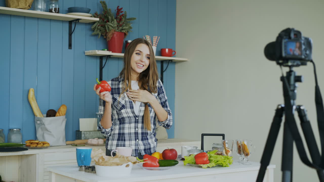 Woman Cooking Tutorial with Red Bell Peppers