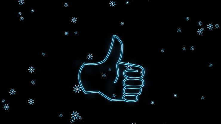 Animazione digitale di fiocchi di neve che cadono su simbolo al neon con icona di pollice in su su sfondo nero