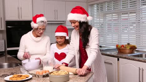 three generation family baking together at christmas time