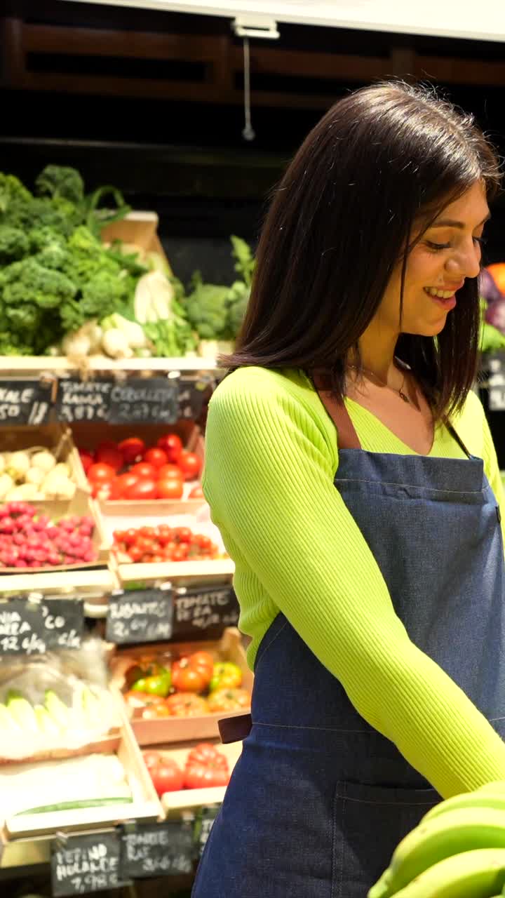 Woman working at a produce stand