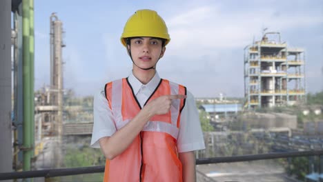 indian female architect explaining the work to employees